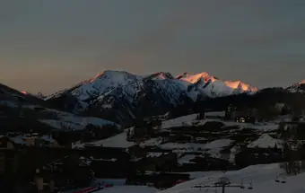 Alpenglow on the peaks above Crested Butte at dusk