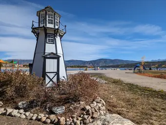 The wooden lighthouse at Frisco Bay Marina, with the reservoir and mountains behind